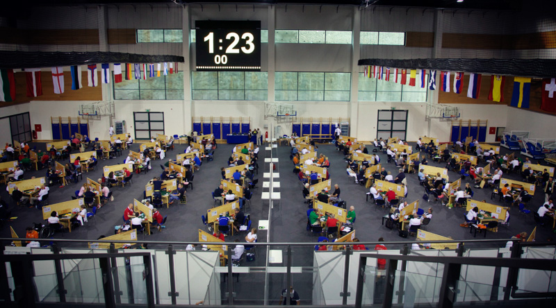 Rows of bridge tables in a large sports hall during the 2014 European Team Championships in Opatija, Croatia